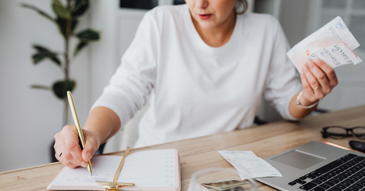 Women working on her finances after a major life change